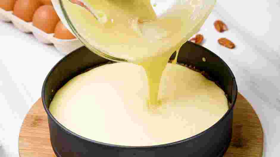 Gluten Free Cheesecake Recipe: Pour the cheesecake filling into the prepared crust.