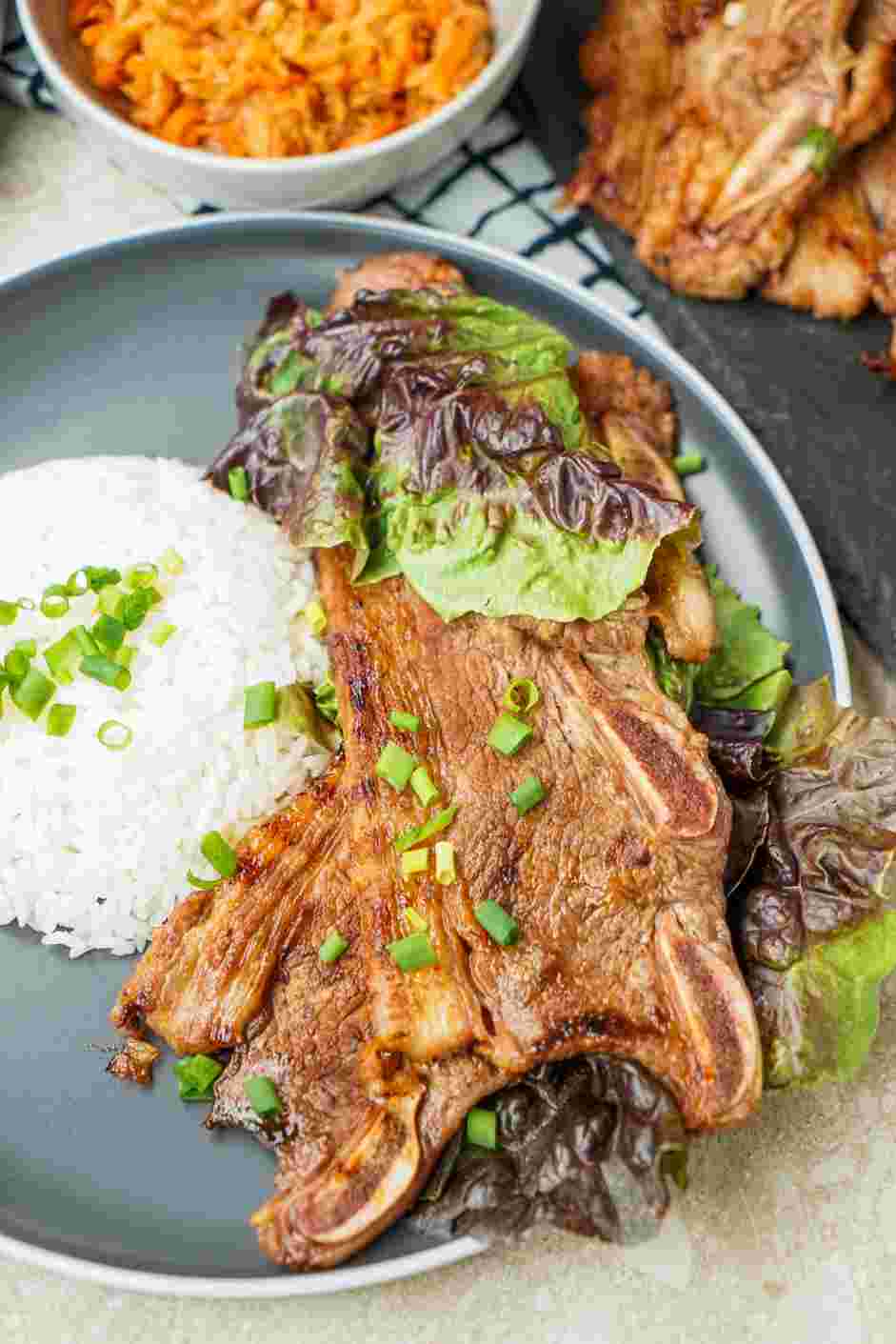 LA Galbi Recipe: Slice the LA galbi horizontally, so that each piece has a bone.