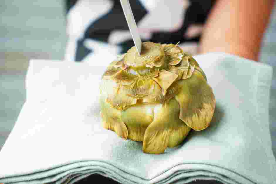 How to Cook Artichokes Step 5: Place it on the stove and bring the water to a boil.