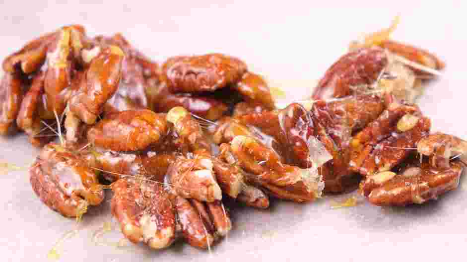 Grape Salad Recipe: Transfer the candied pecans onto the prepared parchment paper.