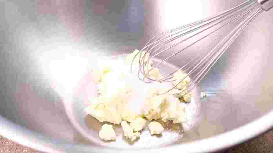 Grape Salad Recipe: In a mixing bowl, add the sugar and the cream cheese.