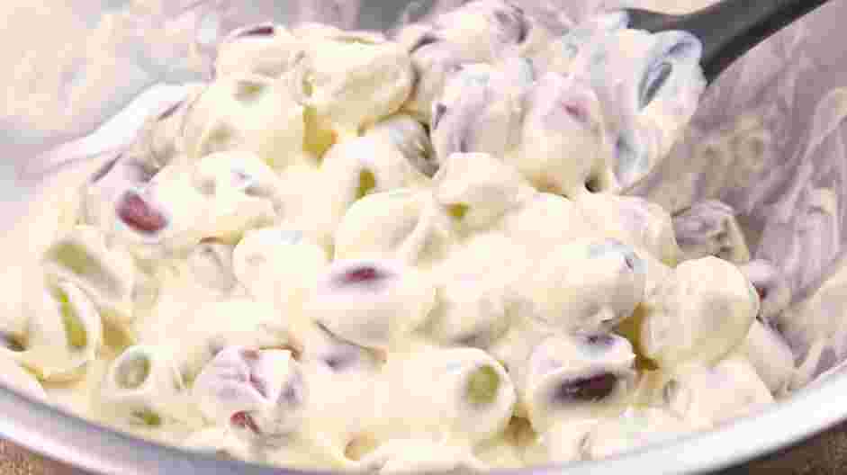 Grape Salad Recipe: Add the grapes and toss until well coated.