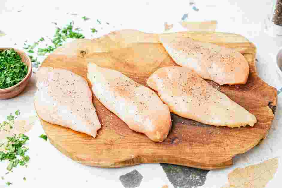 Garlic Parmesan Chicken Pasta Recipe: Season the chicken breasts with salt and pepper.