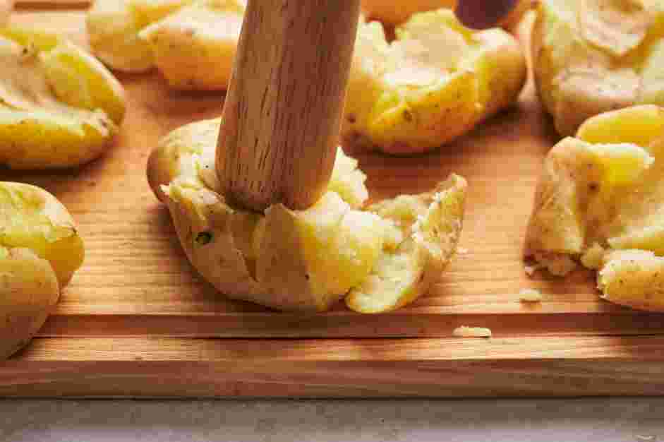 Rosemary Potatoes Recipe: Remove the potatoes and smash each fingerling potato.