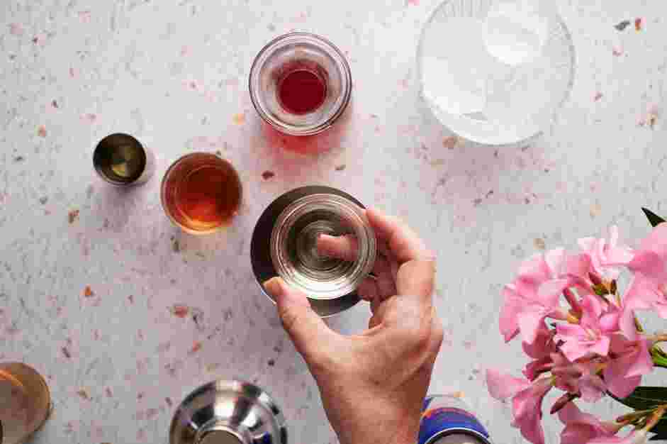 Easy Vegas Bomb Recipe: Fill a cocktail shaker with ice.