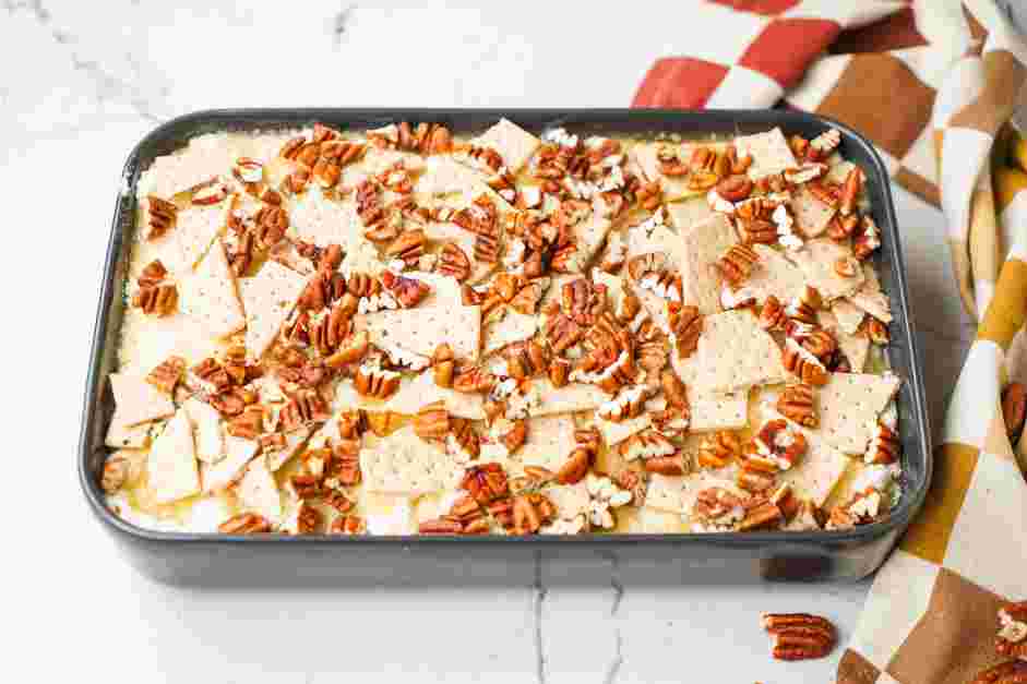 Pumpkin Dump Cake Recipe: Evenly sprinkle the roughly chopped graham crackers and then the raw pecans.