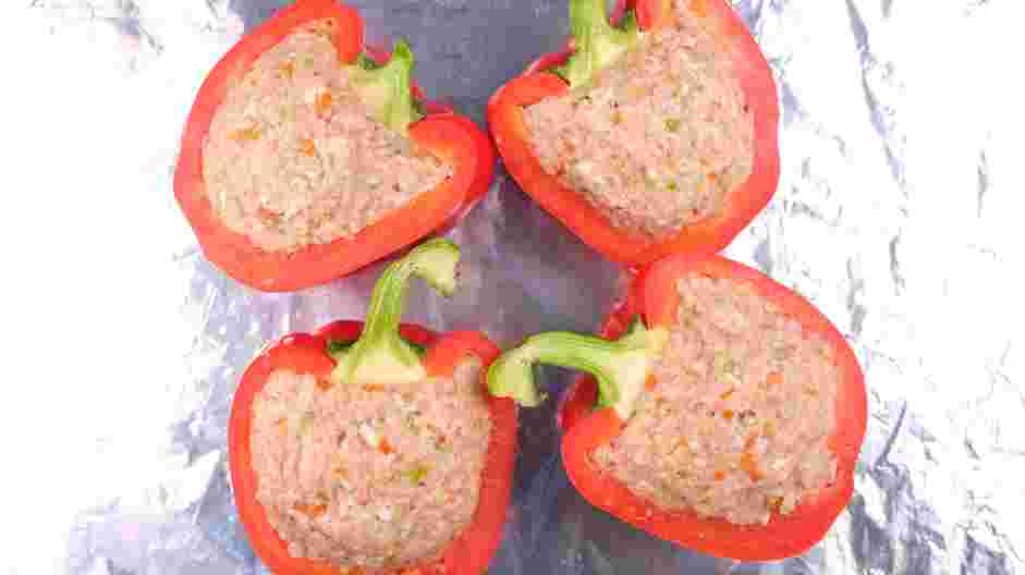 Keto Stuffed Bell Peppers Recipe: Spoon the filling into the peppers.