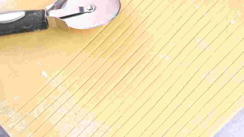 Tagliolini with Tomato Pomodoro Recipe: Using a pizza cutter cut the dough into ¼-inch wide and 8-inch long strips.
