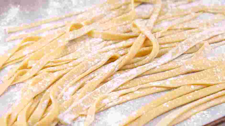 Tagliolini with Tomato Pomodoro Recipe: On a floured cookie sheet, lay out the pasta strips.