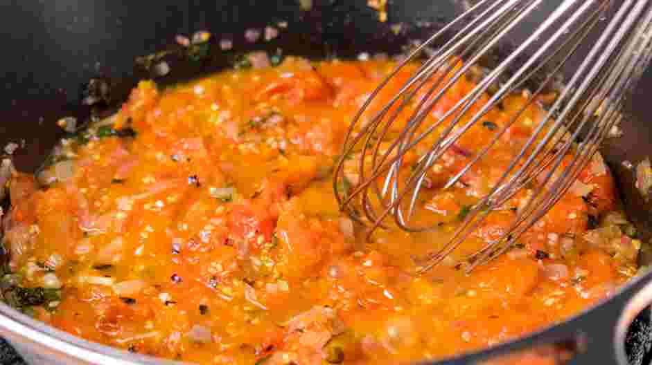 Tagliolini with Tomato Pomodoro Recipe: With a whisk, crush the grilled tomatoes and mix until smooth.