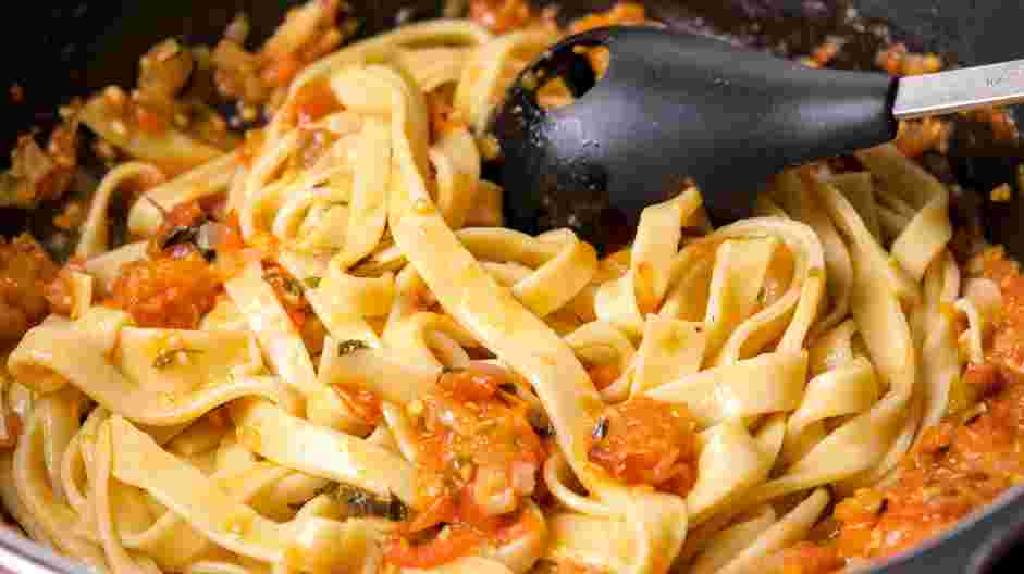 Tagliolini with Tomato Pomodoro Recipe: Drain the cooked tagliolini in a colander and add it to your reduced pomodoro sauce.