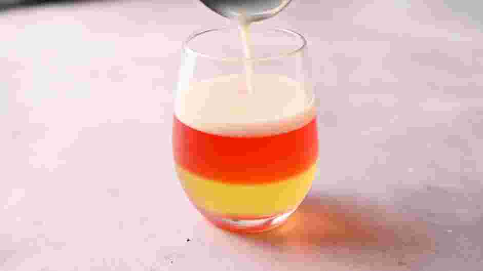 Halloween Jello Shots Recipe: Fill the remaining ⅓ of the tall shot glass with the white layer.