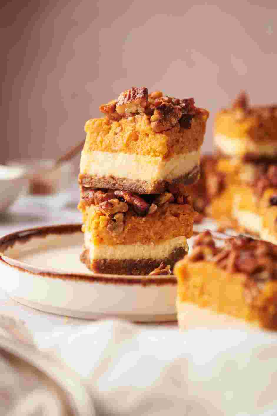 Pumpkin Cheesecake Bars Recipe: Garnish with whipped cream, if desired.