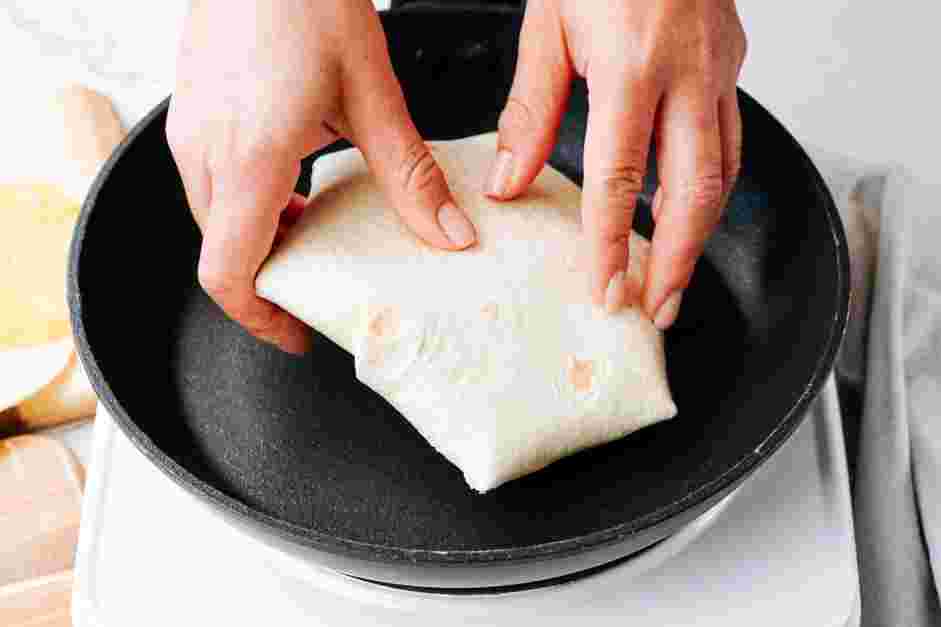 Black Bean Crunchwrap Supreme Recipe: Heat a nonstick pan over medium high heat and place the wraps with the folded side down first.