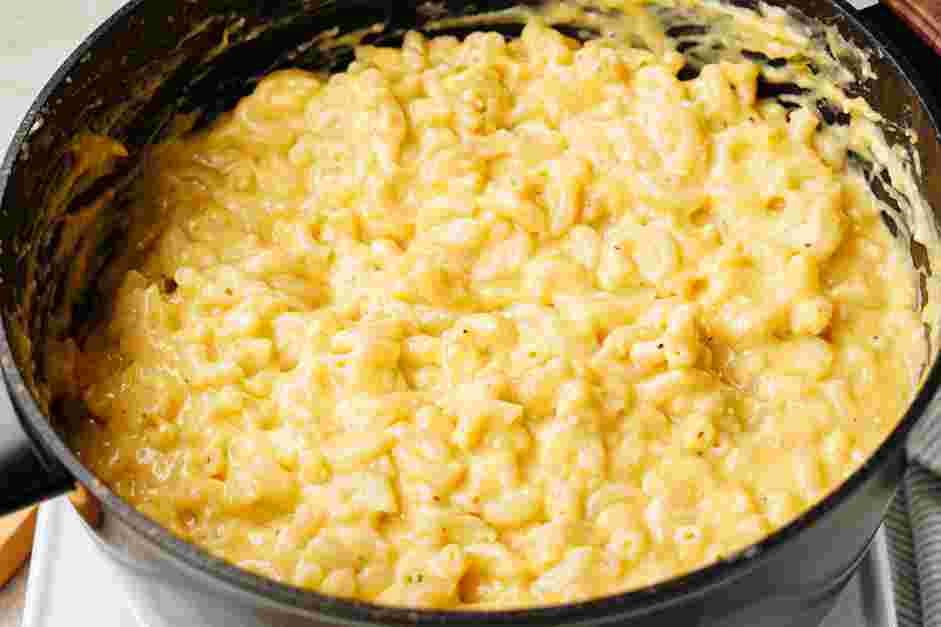 Butternut Squash Mac and Cheese Recipe: Drain the macaroni and add the macaroni to the butternut squash cheese sauce.