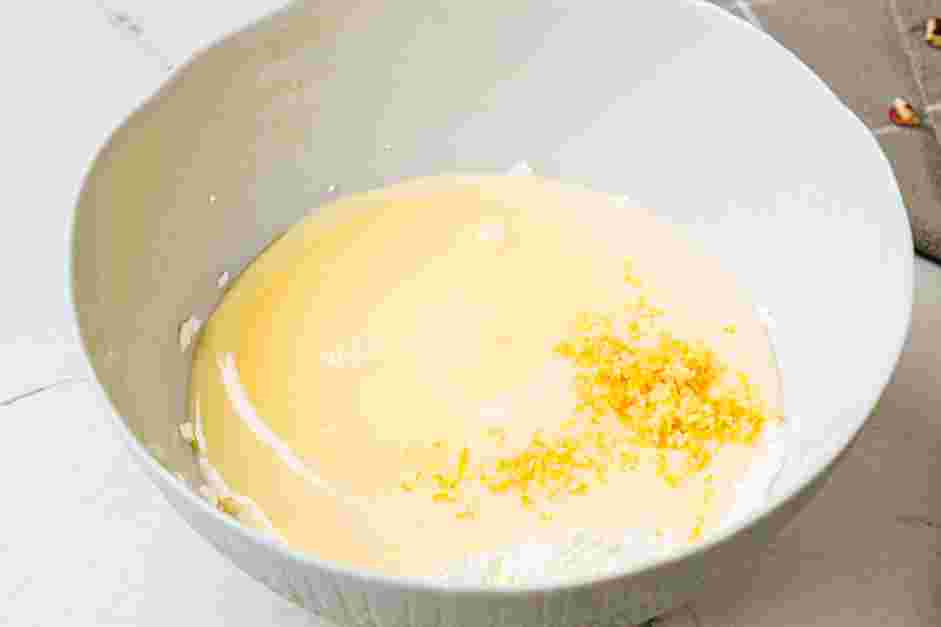 Million Dollar Pie Recipe: Add the sweetened condensed milk, lemon zest and lemon juice to the bowl.