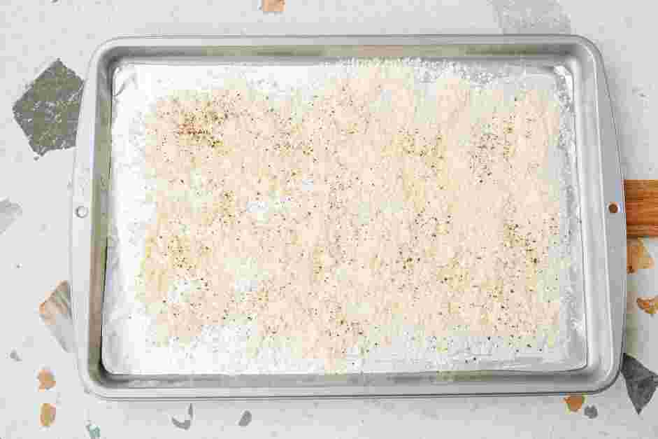 Parmesan Crusted Potatoes Recipe: While the potatoes dry, line a sheet pan with aluminum foil with the shiny side facing down.