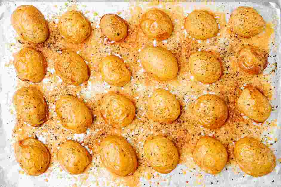 Parmesan Crusted Potatoes Recipe: Roast the potatoes until golden brown and crispy, about 20 minutes.