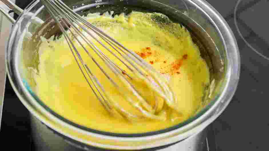 Hollandaise Sauce Recipe: Continue to whisk the sauce until it is velvety, smooth and thickened.