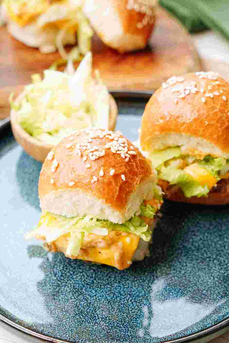 Cheeseburger Sliders Recipe: Remove the top buns and add the shredded iceberg lettuce before serving.