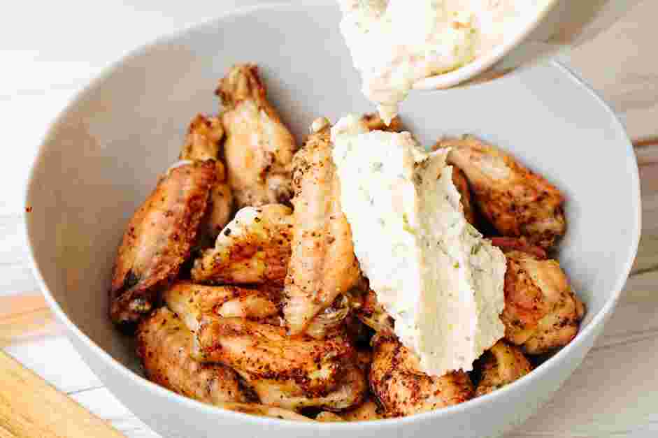 Garlic Parmesan Wings Recipe: When the chicken wings are done, place the chicken wings in a big bowl.