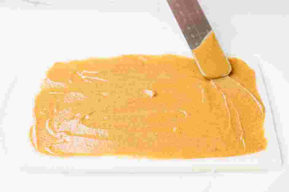Potato Candy Recipe: Spread a thin layer of peanut butter (or cookie butter) over the entire rectangle with the exception of a ¼ inch around the edges.