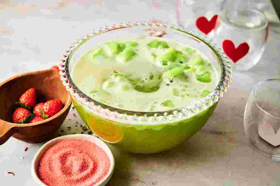 Grinch Punch Recipe: In a large punch or mixing bowl, add the lime sherbet.