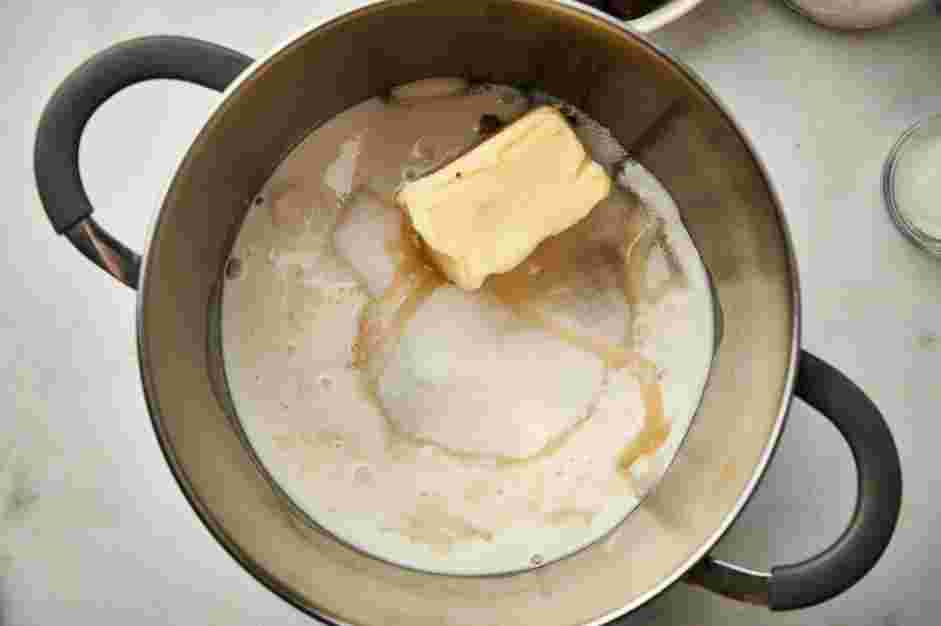 Fantasy Fudge Recipe: In a heavy 3-quart saucepan, add the granulated sugar, corn syrup, unsalted butter and evaporated milk.