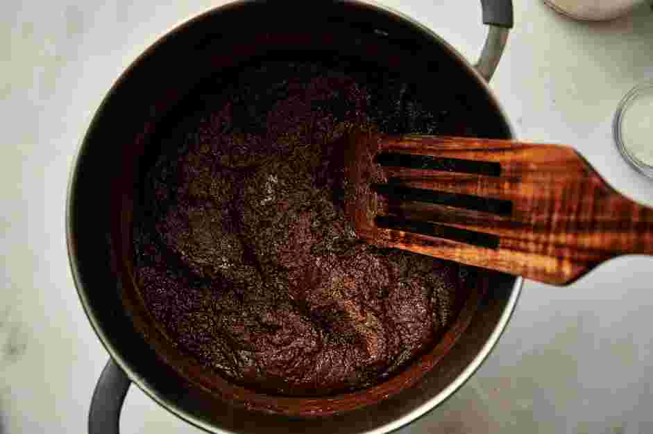 Fantasy Fudge Recipe: Remove the pan from the heat and use a wooden spoon to stir in bittersweet chocolate pieces until melted.