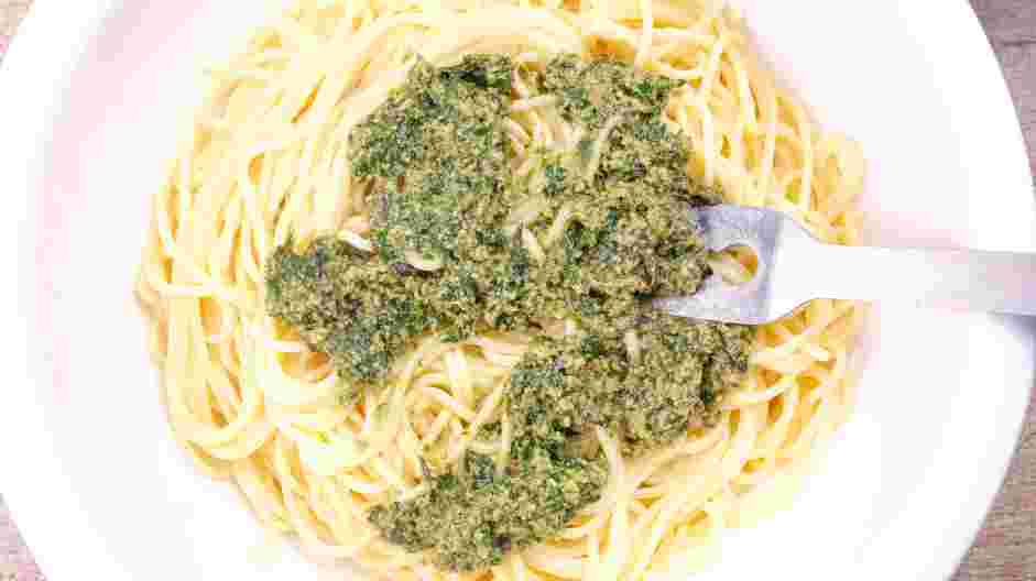 Creamy Pesto Pasta Recipe: Add creamy pesto to the bowl and toss until the pasta is well coated.