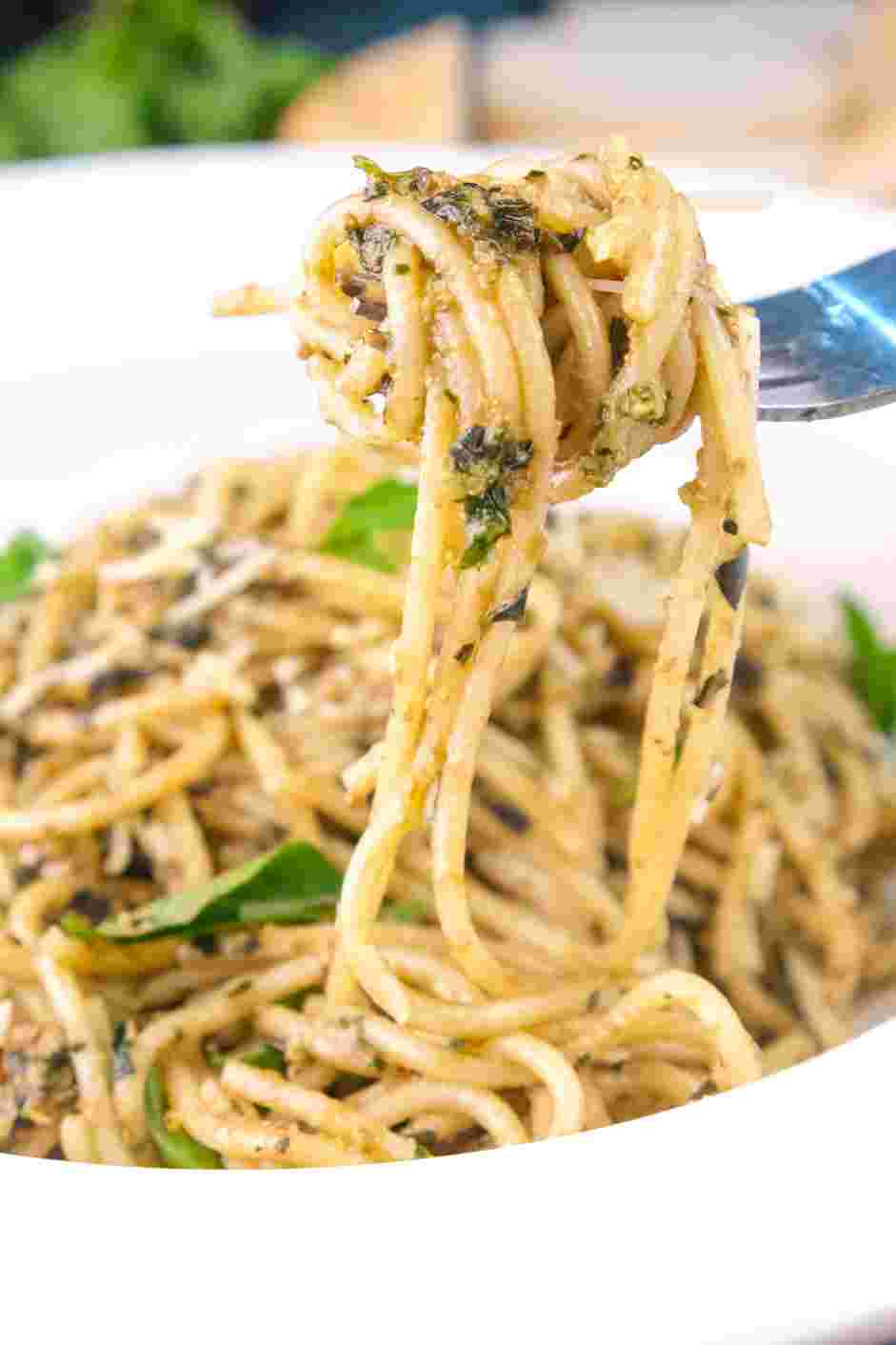 Creamy Pesto Pasta Recipe: Garnish with a fresh grating of Parmesan and enjoy!