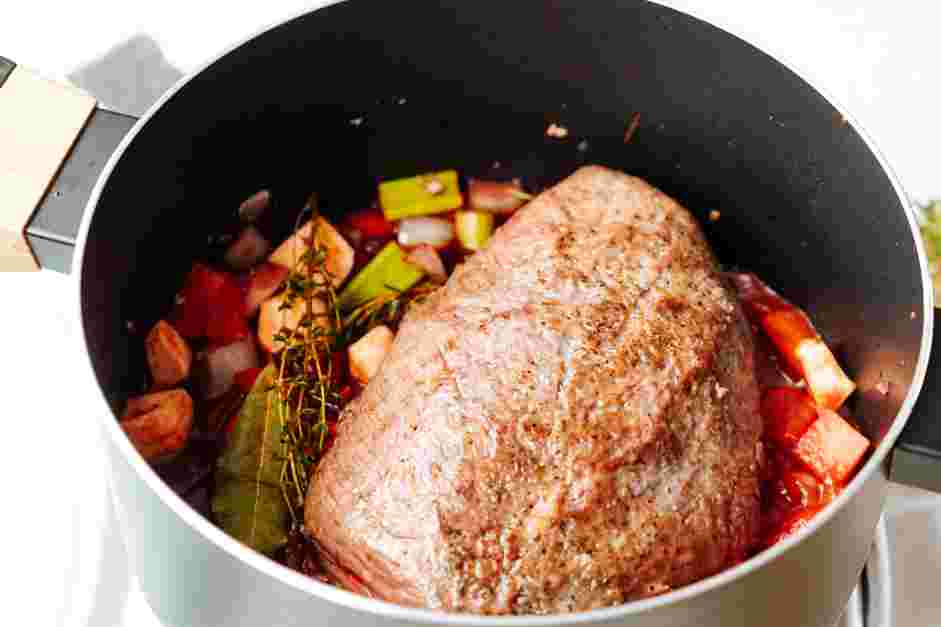 Braised Beef Recipe: Return the seared chuck roast to the pot.