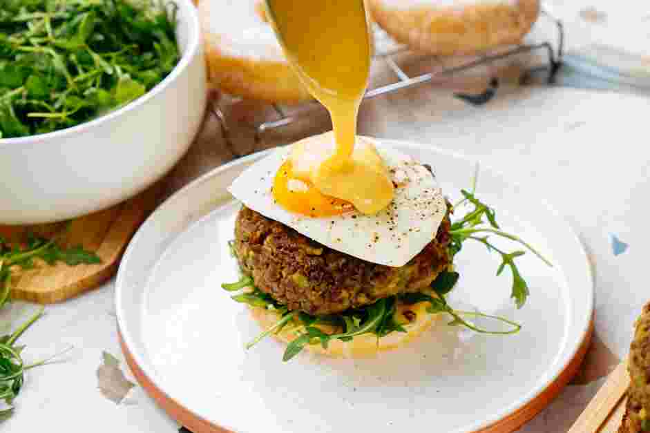 Donut Burger Recipe: Gently lay a fried egg on top of each patty.