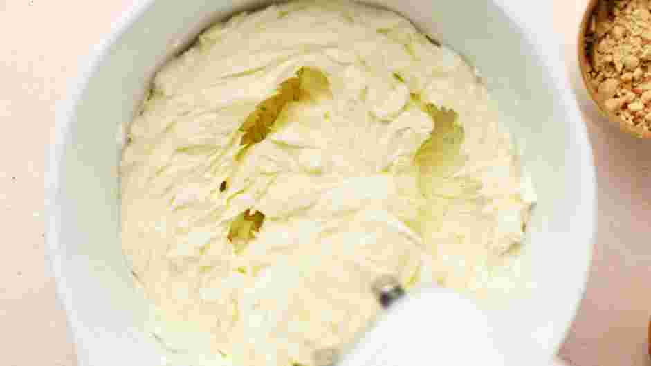 Caramel Apple Cheesecake Bars Recipe: Prepare the cheesecake filling.