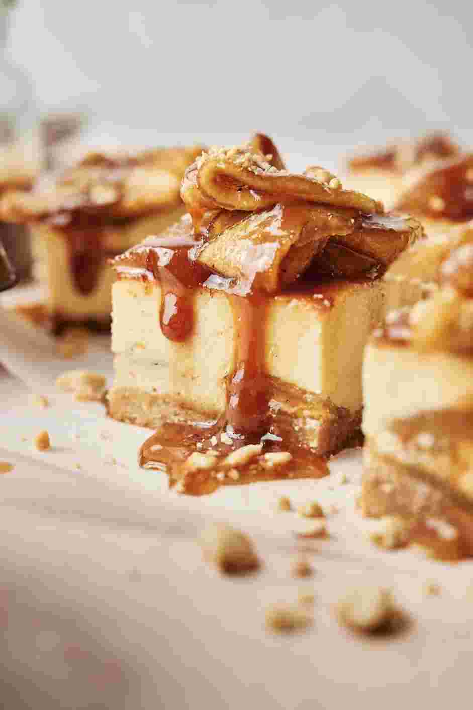 Caramel Apple Cheesecake Bars Recipe: Top each square with the reserved caramel apple filling and top with a drizzle of salted caramel sauce.