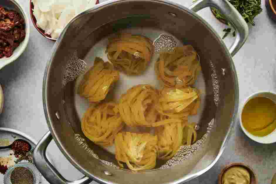 Tuscan Chicken Pasta Recipe: Prepare the pasta.