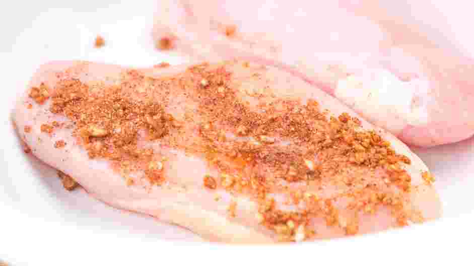 Coconut Chicken Recipe: Rub the spice mixture evenly over both sides of the chicken breasts.