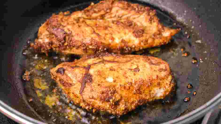 Coconut Chicken Recipe: In an oven-safe skillet over medium-high heat, heat the avocado oil.