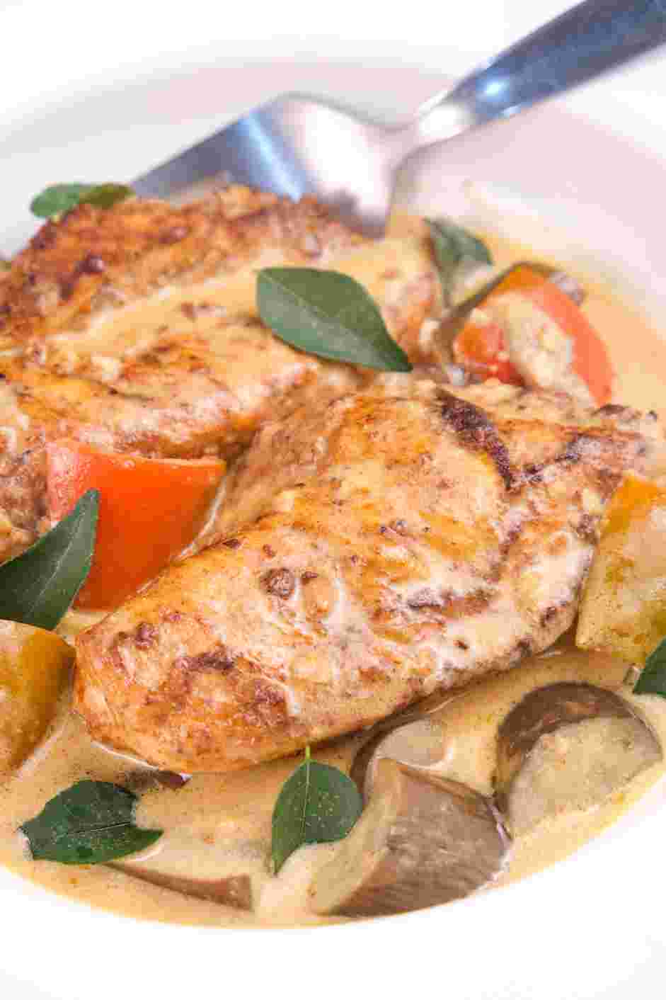 Coconut Chicken Recipe: Remove the skillet from the oven, and let the chicken rest for a few minutes before serving.