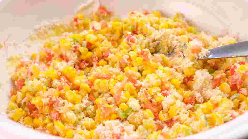 Corn Cakes Recipe: In a medium bowl, combine the corn kernels, chopped red bell pepper, green onions (or scallions), panko, cornmeal, egg, mayonnaise, salt, hot sauce and lemon juice.