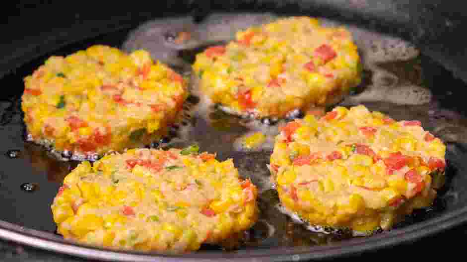 Corn Cakes Recipe: Place the butter in a large skillet over medium heat, and cook the corncakes for about 3 minutes, then flip and cook another 2 minutes, until golden brown.