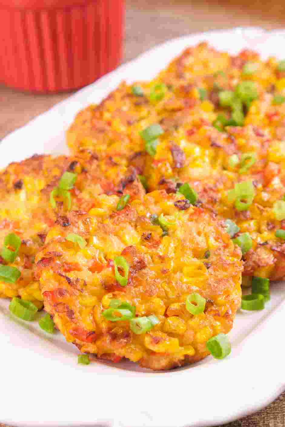 Corn Cakes Recipe: Drain them on the paper towels, and then serve them hot with cocktail sauce.