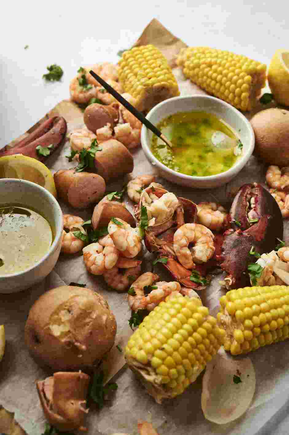 Low Country Boil Recipe: Drain and discard the liquid and bay leaves.