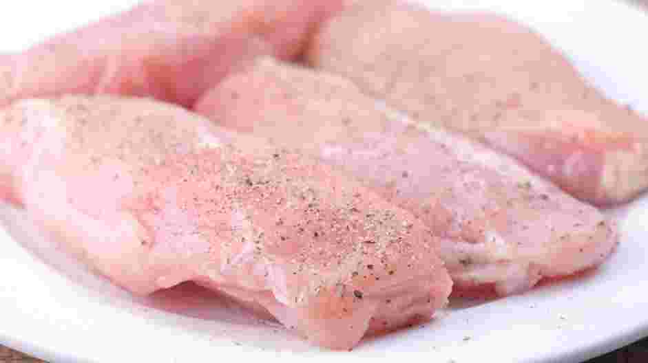 No Peek Chicken Recipe: Season the chicken breasts with salt and pepper.