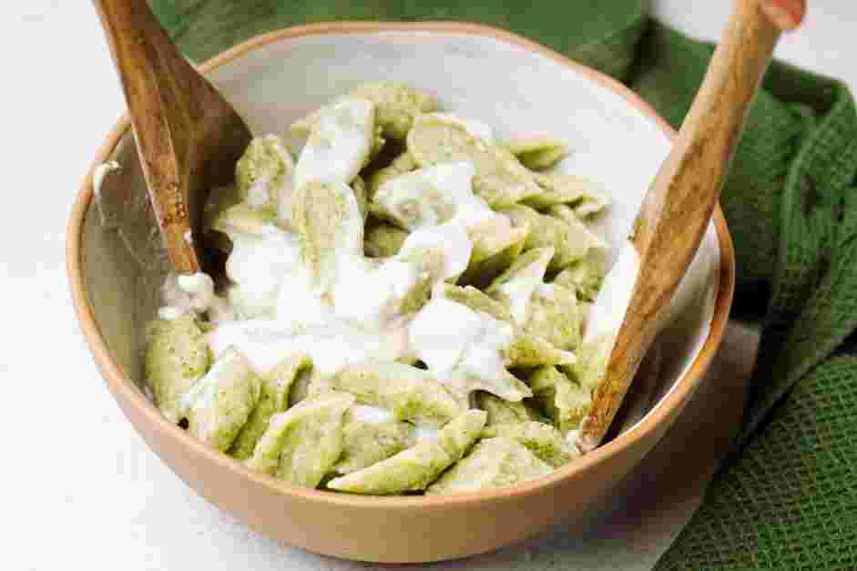 High Protein Broccoli Pasta Recipe: Strain the pasta into the sauce and toss until well coated.