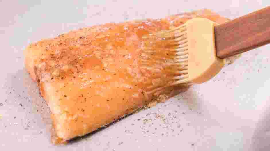Honey Glazed Salmon Recipe: Brush the salmon fillets with the honey glaze.