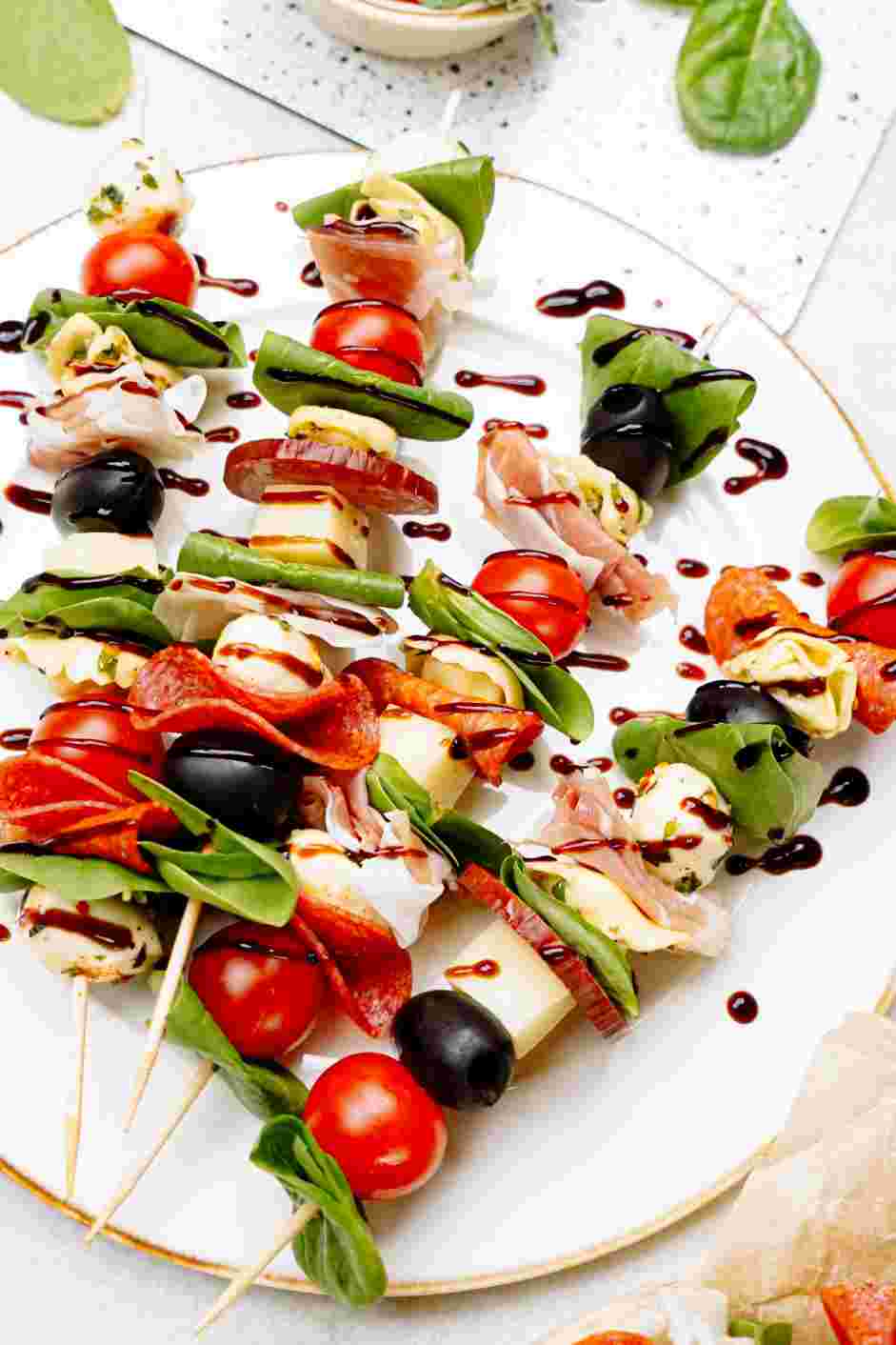 Antipasto Skewers Recipe: Plate the skewers on a platter and drizzle lightly with balsamic glaze before serving.