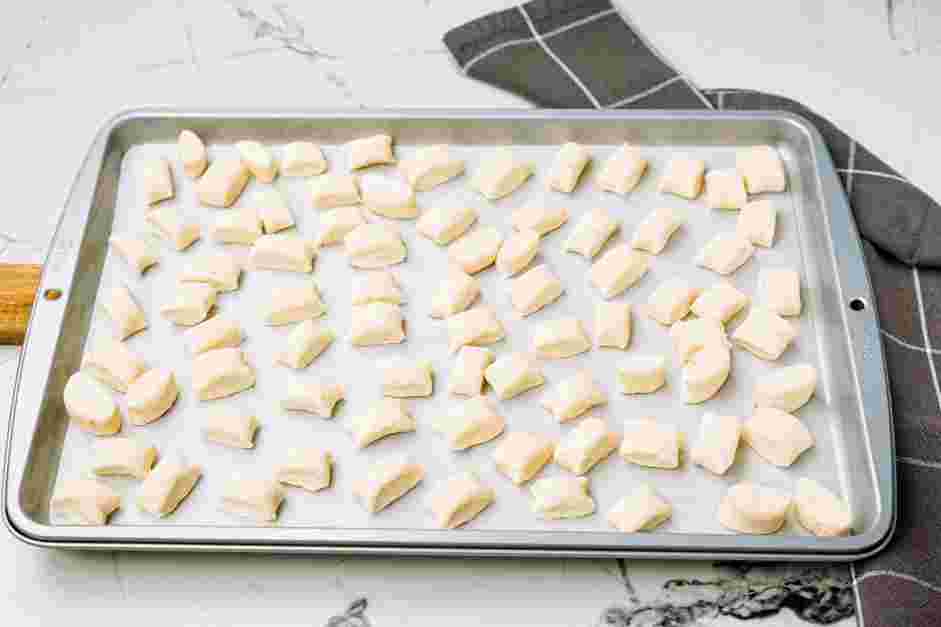 Ricotta Gnocchi with Sage Brown Butter Recipe: Cut each rope into &frac34;-inch pieces and set aside on a baking sheet.