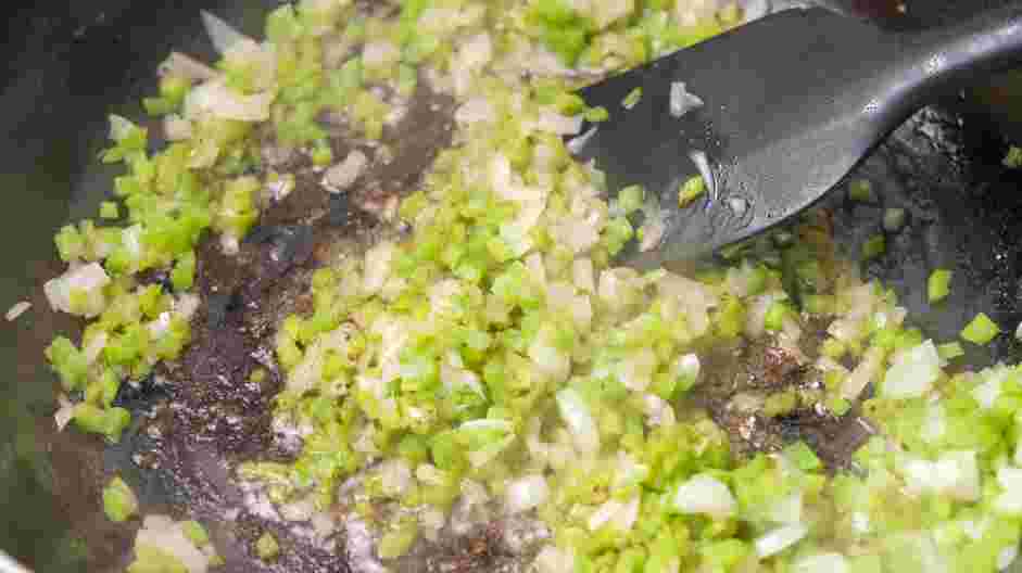 Philly Cheesesteak Egg Rolls Recipe: Add the remaining tablespoon of olive oil and add the chopped bell pepper and yellow onion.