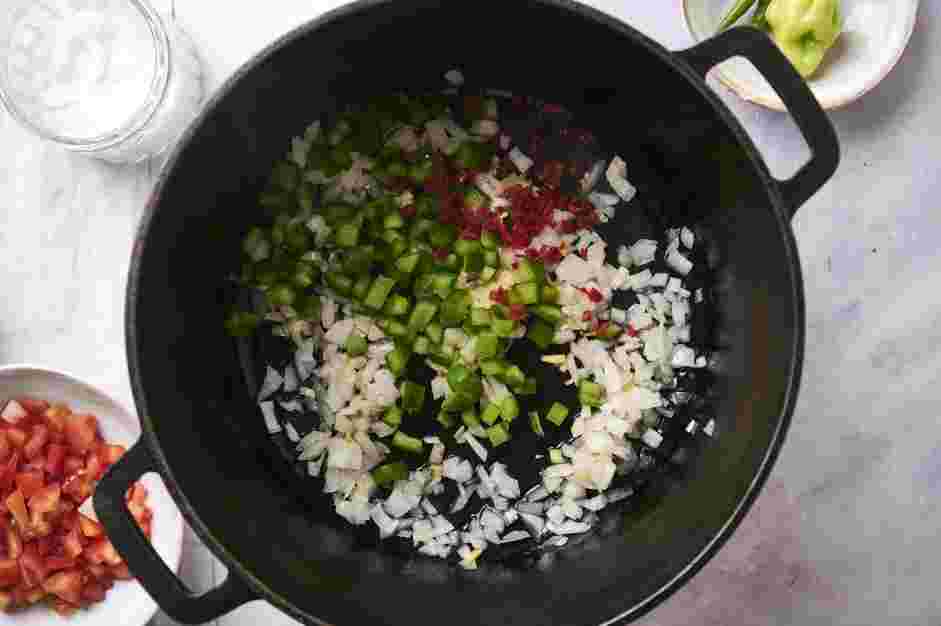 Green Chili Stew Recipe: In a pot over medium heat, heat the coconut oil.